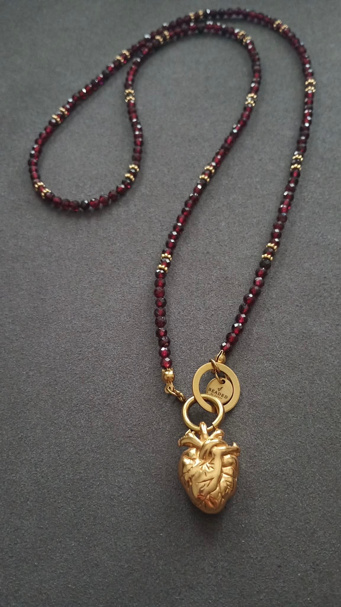 HEART-LED GARNET NECKLACE